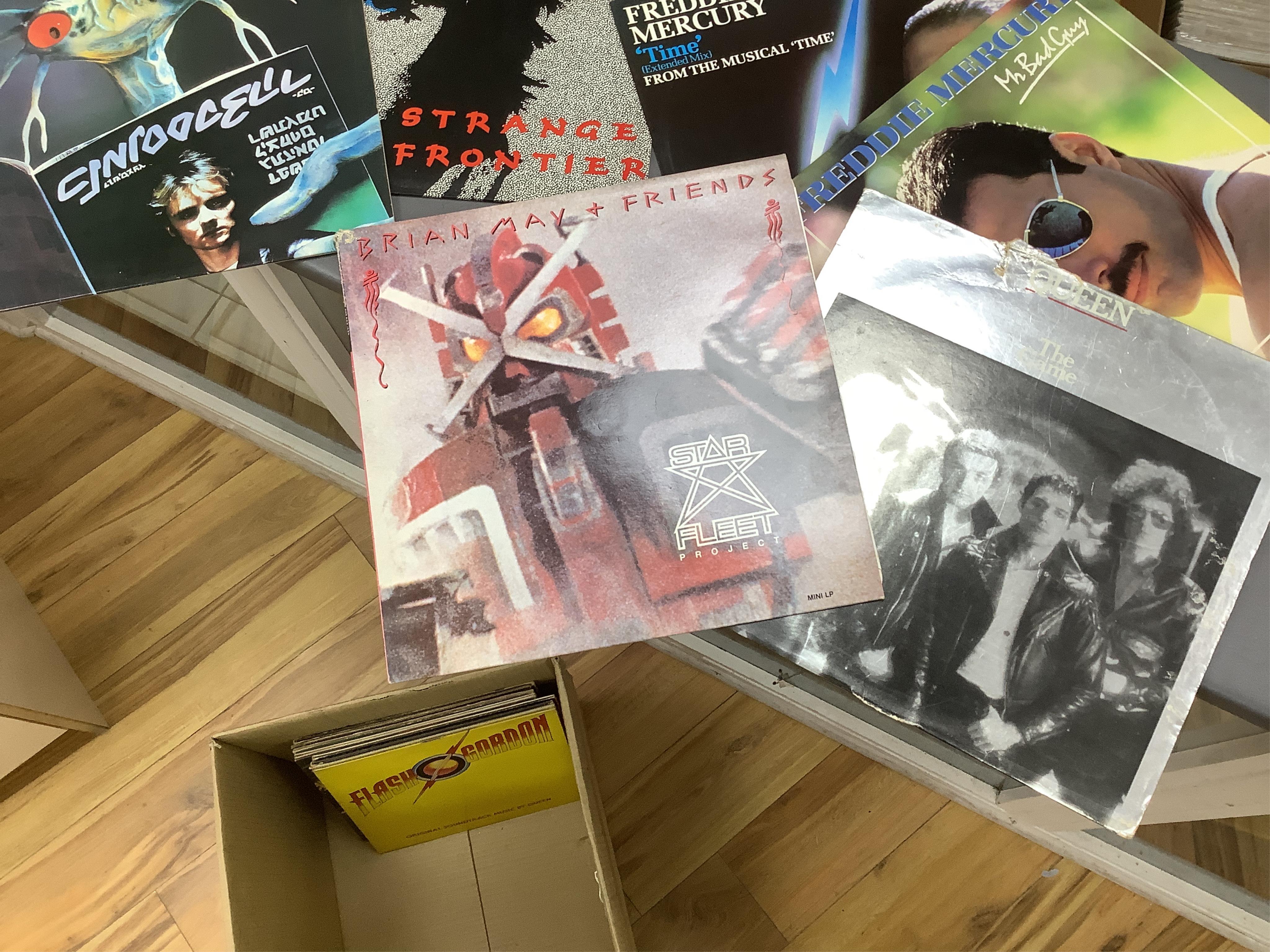 Queen related LPs and other items comprising; fifteen albums including; Queen II, Sheer Heart Attack, a Night at the Opera, Jazz (with poster), Live Killers, Starfleet Project, Mr. Bad Guy, Fun in Space, Strange Frontier